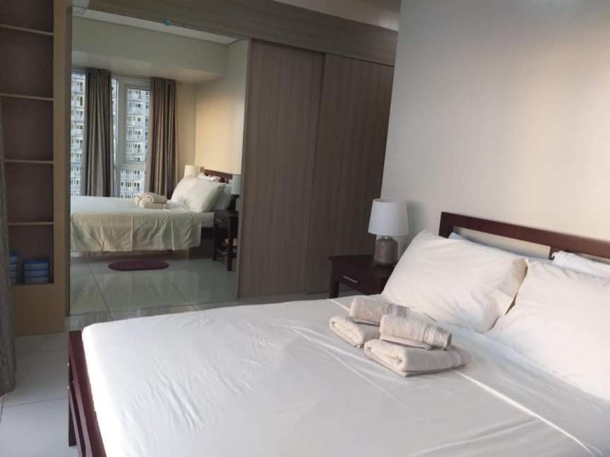 De Luxe, Standard And Studio Suites -The Breeze Residences-Close To Airport,Mall Of Asia, Us Embassy Манила Экстерьер фото